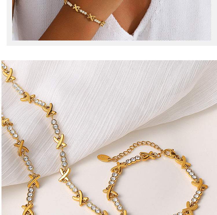 X-shaped Diamond-studded Necklace Set For Ladies - Luxurious And High-end, Featuring A Sparkling Array Of Diamonds And A Stainless Steel Bracelet Accessory.
